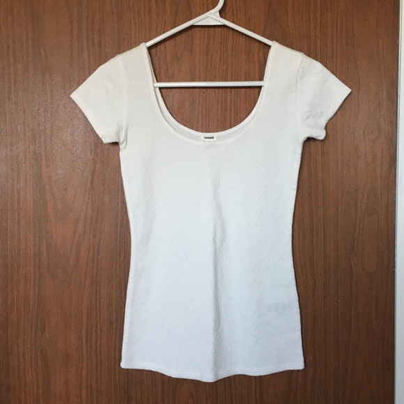 White low cut Garage t shirt.